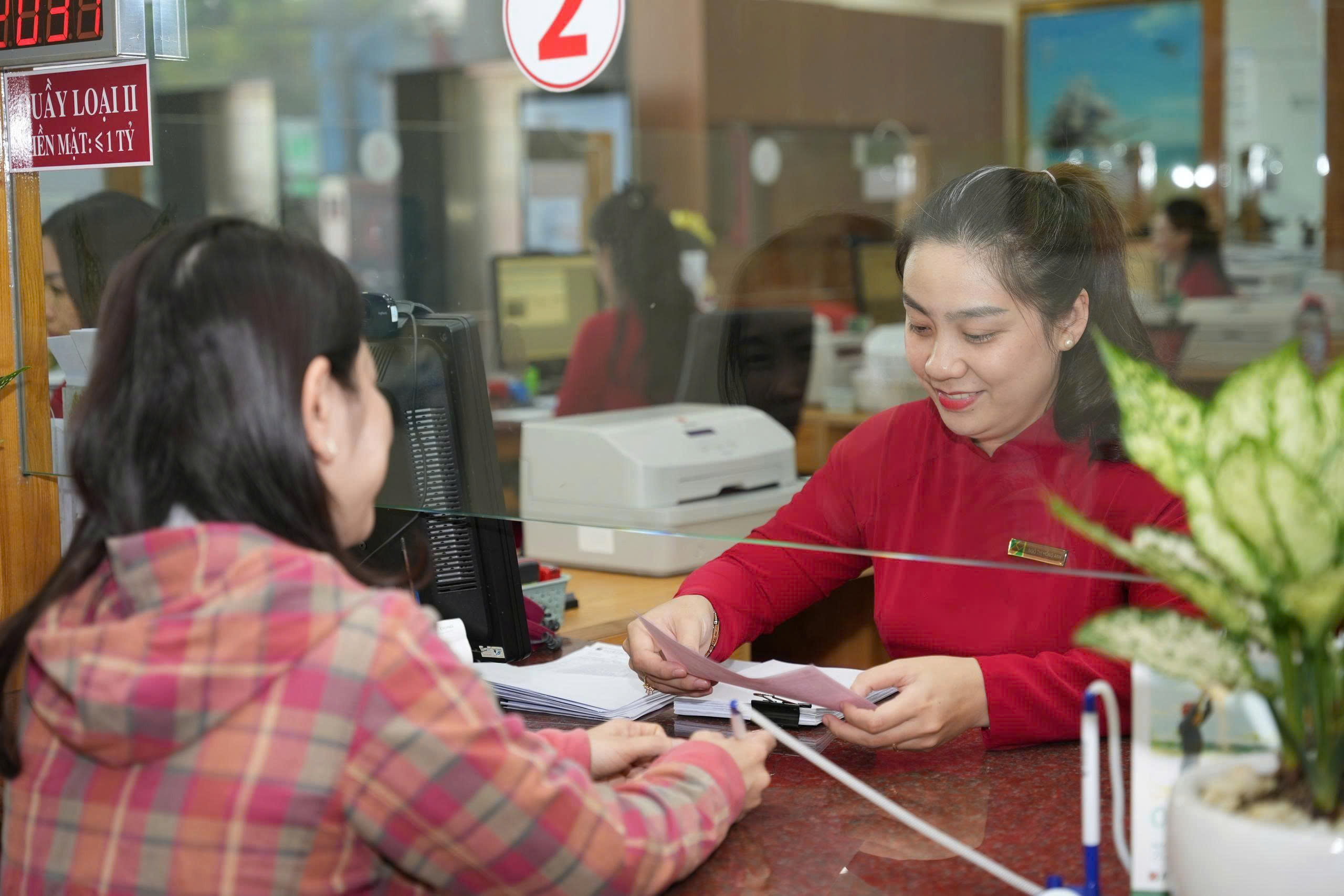 Cân đối nguồn vốn, ổn định lãi suất - Ảnh 1.