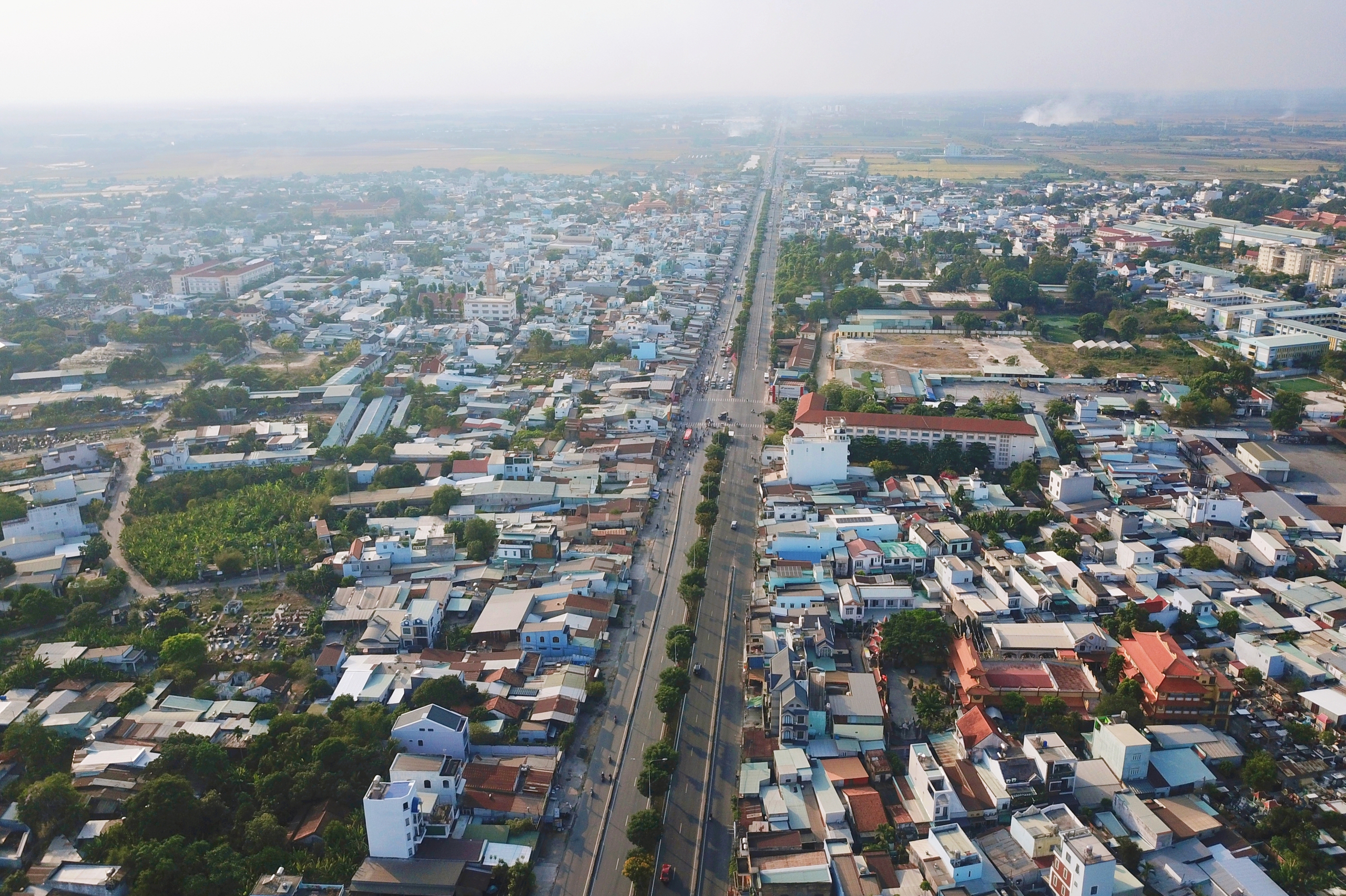 Giá đất ở được bồi thường cao nhất hơn 66,6 triệu đồng/m²  ở dự án nâng cấp quốc lộ 22 TP.HCM - Ảnh 1.