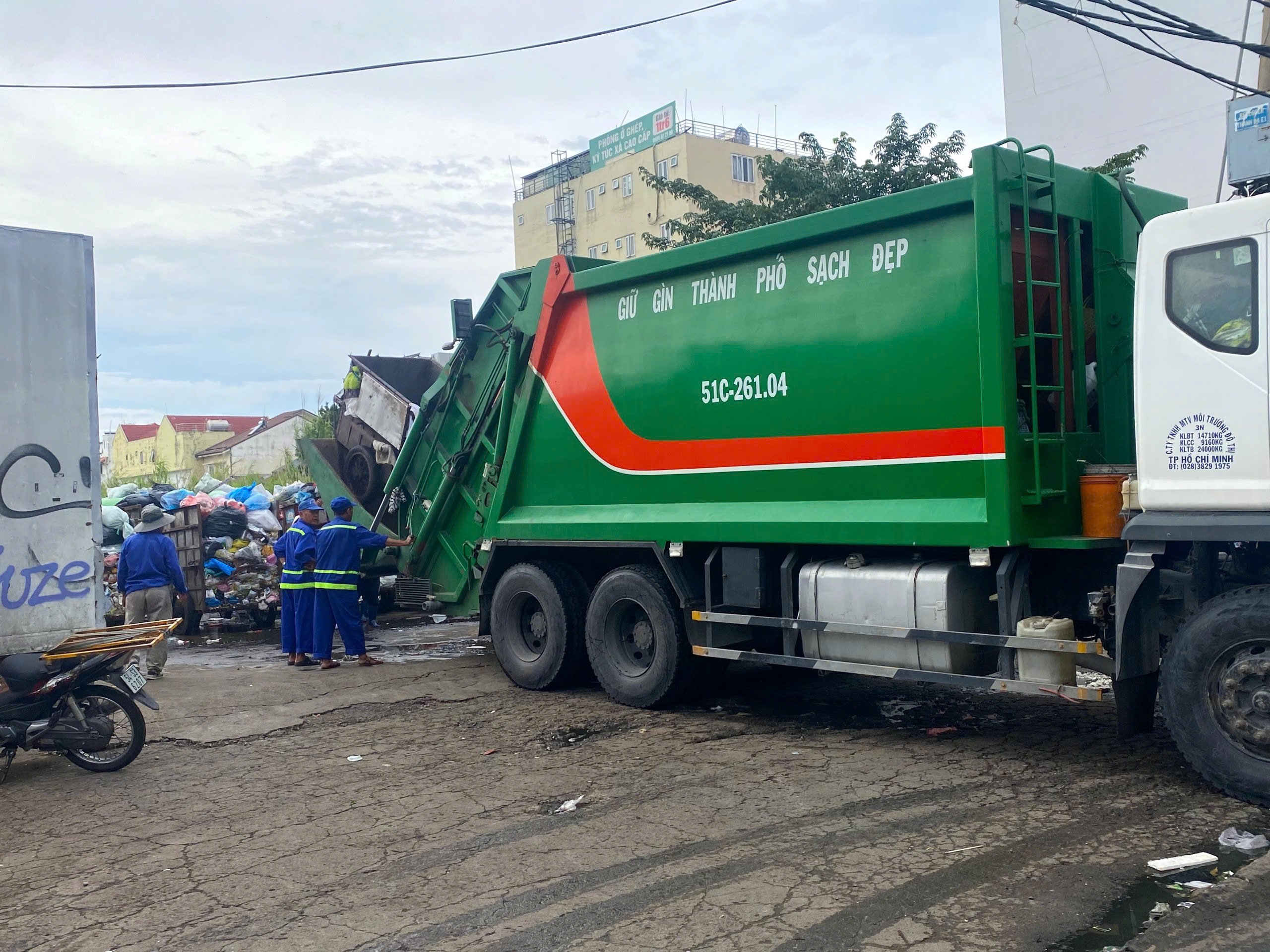 Minh bạch từng cân rác thải - Ảnh 1.