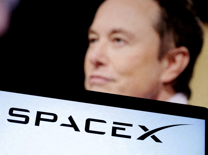 SpaceXs logo and an Elon Musk photo are seen in this illustration created on December 19, 2022. REUTERS/Dado Ruvic/Illustration/File Photo/File Photo